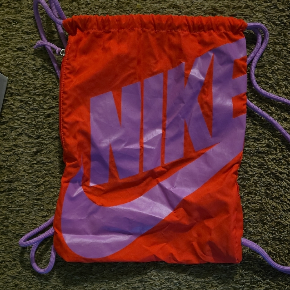 Nike Pink Drawstring Bag with Purple Logo and Cords